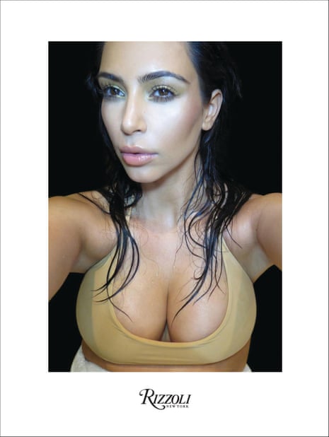 A selfie by Kim Kardashian wearing a tight, revealing vest.
