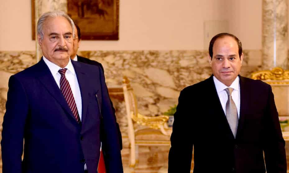 Egypt’s president, Abdel Fatah al-Sisi, right, meeting the Libyan warlord Khalifa Haftar, left, in Cairo