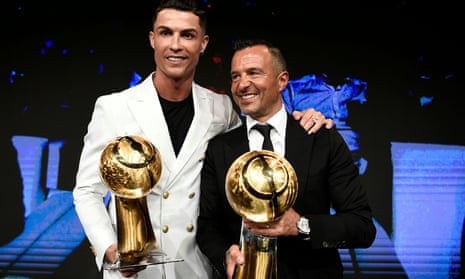 Jorge Mendes after being named agent of the year at the 2019 Dubai Globe Soccer Awards, alongside his client Cristiano Ronaldo.