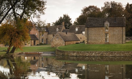 Home Farm from the outside, showing how the buildings are set around a medieval carp pond.