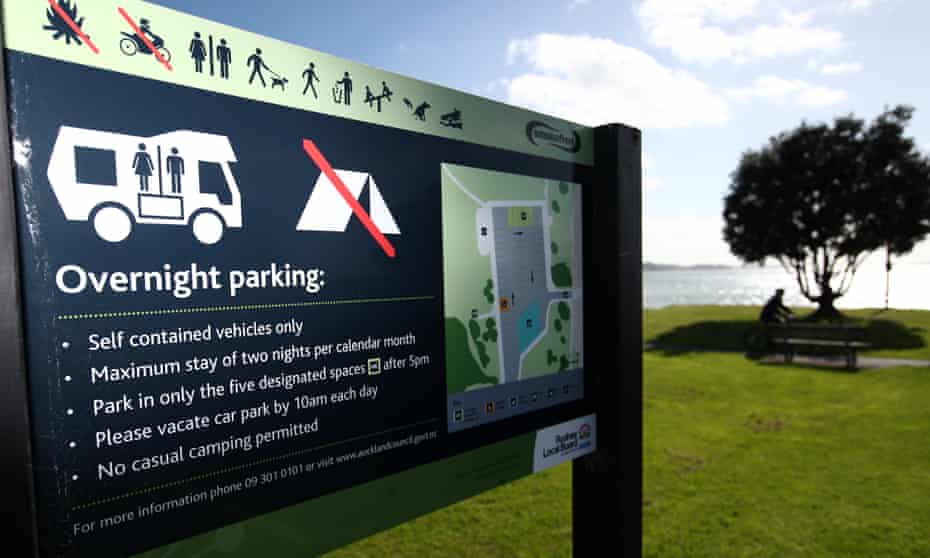 Freedom camping signs at Sunburst Reserve in Snells Beach in Auckland, New Zealand