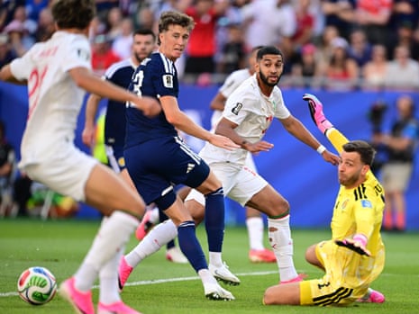 Jack Hendry of Scotland in action against Ismael Saibari of Morocco