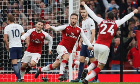 Shkodran Mustafi opens the scoring for Arsenal as Tottenham suffer more misery against one of their big rivals.