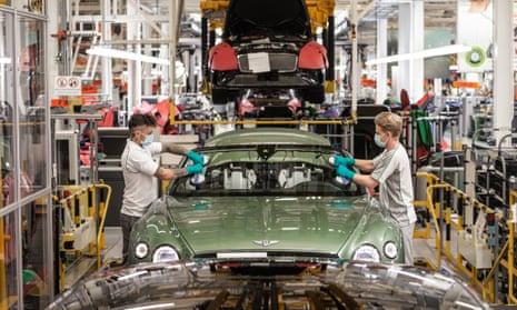 Two workers at the Bentley factory in Crewe
