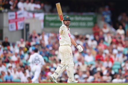 Travis Head celebrates reaching a half century for Australia on day two of the fifth Ashes Test at the SCG