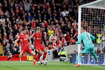 Alexis Mac Allister (right) converted a Mohamed Salah cross to give Liverpool the lead in the first half.