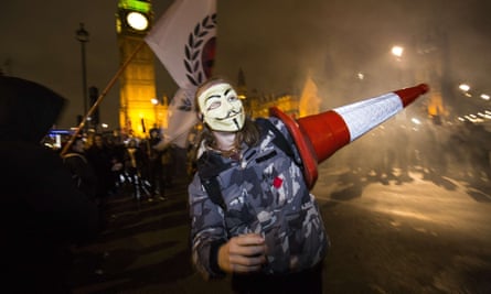 A protester at the Million Masks March in Parliament Square, London, organised by Anonymous in November 2015.