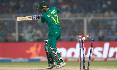 Quinton de Kock of South Africa is bowled by Mohammed Siraj of India.