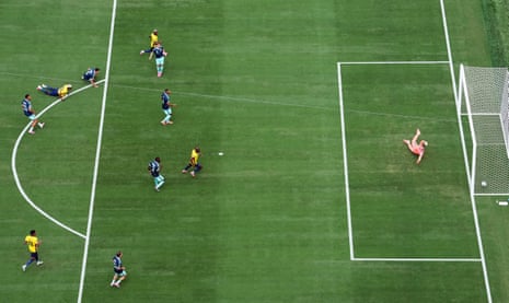 Ecuador's Nilson Angulo scores their first goal past Germany's Manuel Neuer.