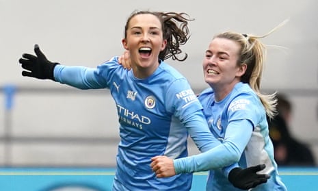 Caroline Weir celebrates with Lauren Hemp after scoring Manchester City’s winner against Manchester United last month