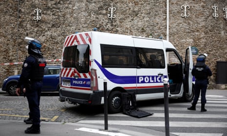 French police cordoned off Iranian consulate in Paris where a man is threatening to blow himself up
