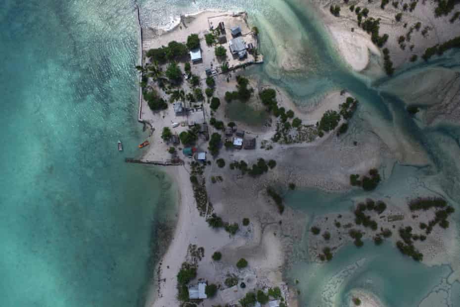 Salt water from sea incursions and storm surges have isolated some houses on the lagoon side around the village of Eita on South Tarawa. The area has become a wasteland and rendered the soil unable to sustain any crops.