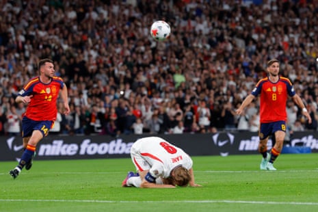 Harry Kane reacts after hitting the crossbar with his penalty