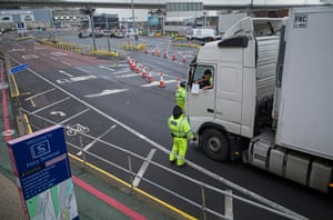Police and port security stop cars and lorries and check their paperwork before letting them enter France at the port of Dover