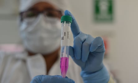 A researcher in Mexico works with reagent samples for taking Covid-19 tests.