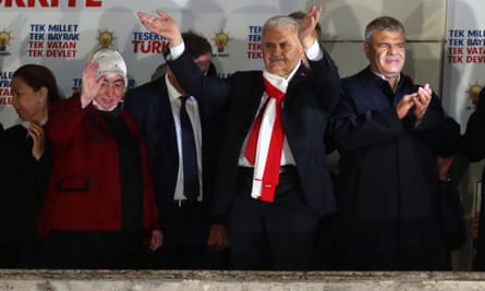 Turkish prime minister Binali Yıldırım waves at his supporters at the AKP headquarters in Ankara.