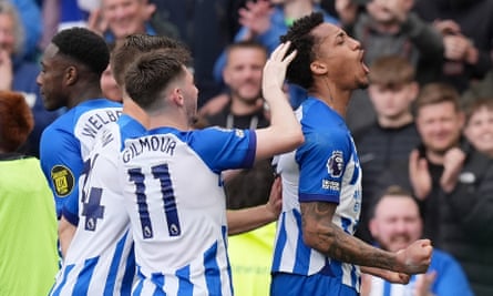 João Pedro celebrates with his teammates after putting Brighton ahead