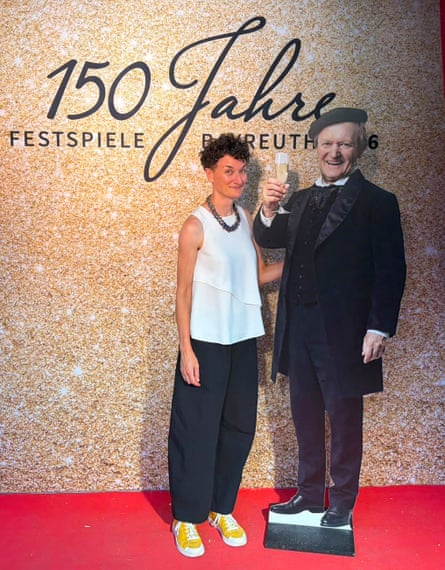 Smiling, improbably’ … Flora Willson is toasted by Wagner himself.