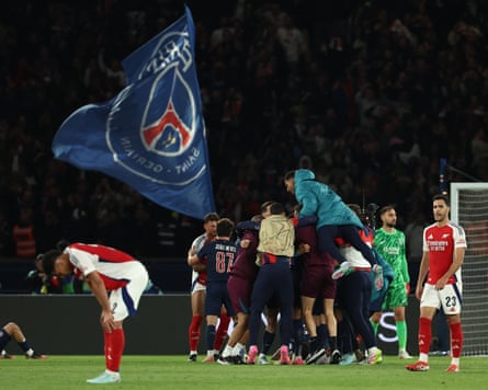 TOPSHOT-FBL-EUR-C1-PSG-ARSENAL<br>TOPSHOT - Arsenal's players react as PSG's players celebrate their victory at the end of the UEFA Champions League semi-final second leg football match between Paris Saint-Germain (PSG) and Arsenal at the Parc des Princes stadium in Paris, on May 7, 2025. (Photo by FRANCK FIFE / AFP) (Photo by FRANCK FIFE/AFP via Getty Images)