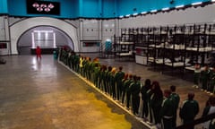 Contestants line up in the dormitory in Netflix’s Squid Game: The Challenge