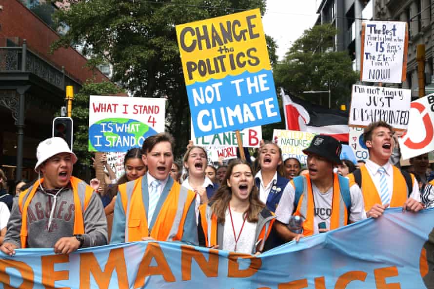 Students march through the streets during a strike to raise climate change awareness