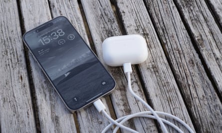 Charging a set of AirPods Pro from the USB-C port on an iPhone 15 Pro.