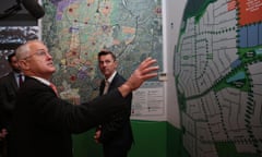 Malcolm Turnbull looks at the town plan drawing at Oran Park Town in Sydney after announcing his Smart Cities policy.