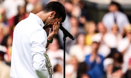 Novak Djokovic feels the strain while delivering the runner-up’s speech.