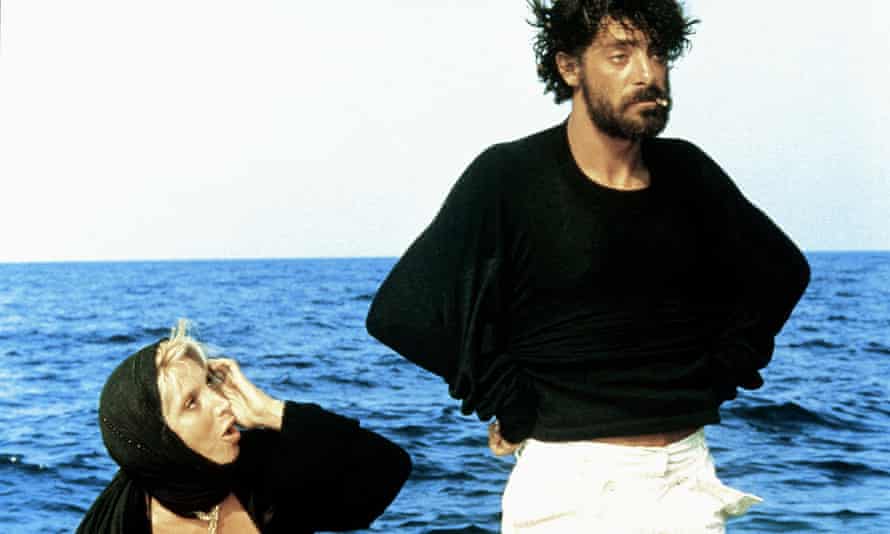 Horribly remade by Guy Ritchie ... Mariangela Melato and Giancarlo Giannini in Swept Away, 1974.