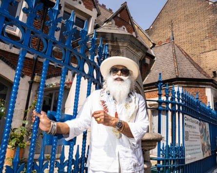 Suresh Singh outside Christ Church primary school, a Spitalfields landmark.