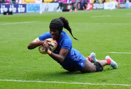 France’s Nassira Konde falls to the ground scoring their first try. Action Images via Reuters/Andrew Boyers