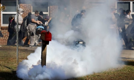 Teargas fired by police officers in response to demonstrators at the construction site of Cop City, near Atlanta, Georgia, on 13 November 2023.