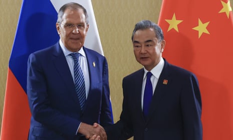 Russian Foreign Minister Sergei Lavrov and Chinese Foreign Minister Wang Yi on sidelines of the G20 summit.