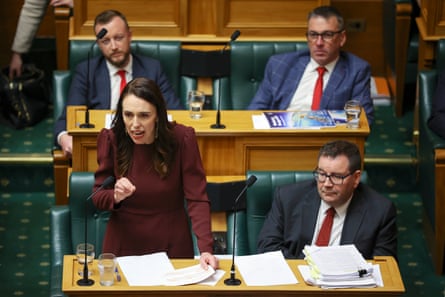 New Zealand prime minister Jacinda Ardern with finance minister Grant Robertson in parliament.