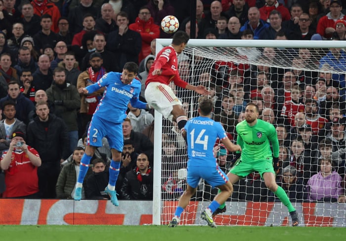Raphael Varane forces a fine save from Oblak.