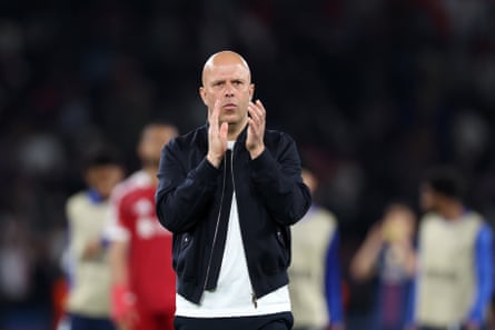 Arne Slot applauds Liverpool’s travelling fans after their defeat at PSG