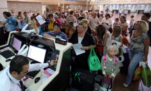 Travellers wait in Sharm el-Sheikh airport.