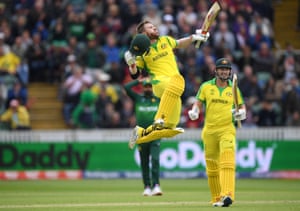David Warner celebrates his century.