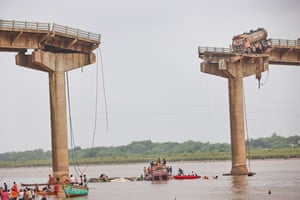 A bridge over a river with a section missing