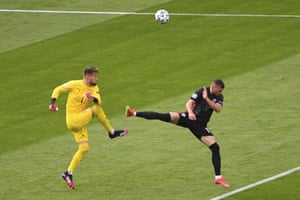 Czech Republic’s goalkeeper Tomas Vaclik beats Croatia’s Ante Rebic to the ball.
