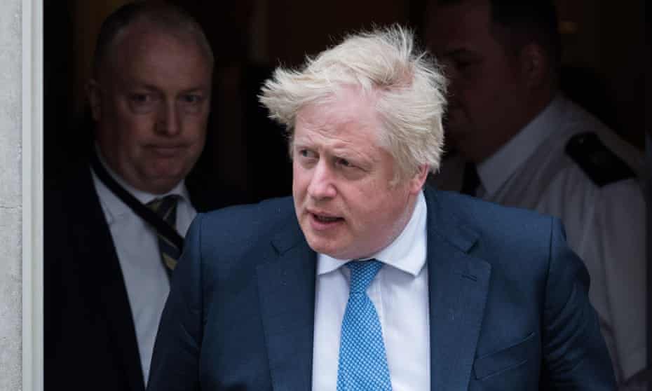 Boris Johnson leaves 10 Downing Street for the House of Commons