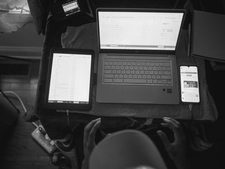 A workstation setup with computer and other electronic equipment.