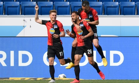 Hertha’s Matheus Cunha (centre) is congratulated by teammates Vedad Ibisevic (right) and Maximilian Mittelstädt after scoring in the 3-0 win at Hoffenheim.