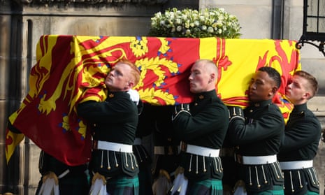 Royal guards carry coffin into St Giles’ Cathedral