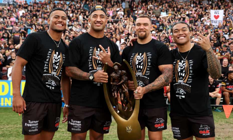 Stephen Crichton, Viliame Kikau, James Fisher-Harris and Brian To'o with the Provan-Summons trophy during the Penrith Panthers’ grand final parade this week.