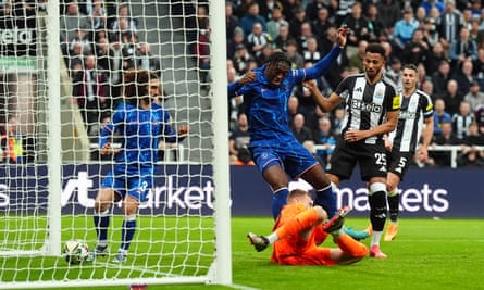 Chelsea’s Axel Disasi scores an own goal to double Newcastle’s lead.