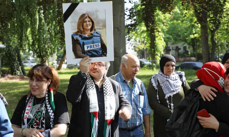 Foreign activists and Palestinians take part in a protest in Berlin on 18 May, after the death of Al Jazeera journalist Shireen Abu Aqleh.