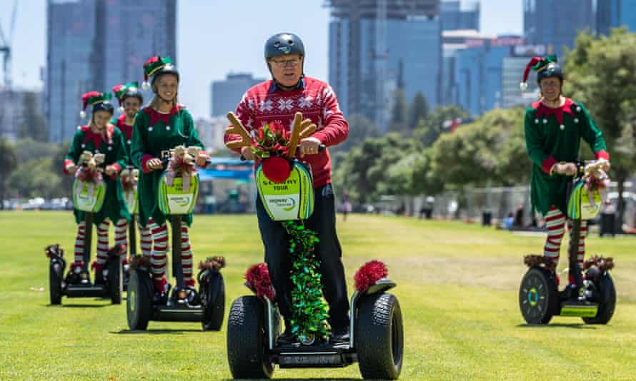 Western Australia tourism minister David Templeman rides a segway after a press conference in Perth.