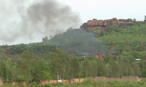 Flames rise following an attack where gunmen stormed Le Campement Kangaba resort in Dougourakoro, to the east of the Malian capital Bamako.
