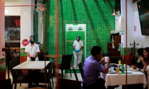 Acrylic separating walls for social distancing are pictured at Los ponchos restaurant during the start of the gradual reopening of commercial activities in Mexico City, Mexico 4 July 2020.